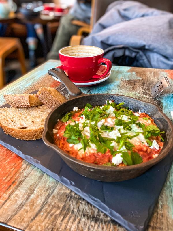 breakfast dish with coffee and bread