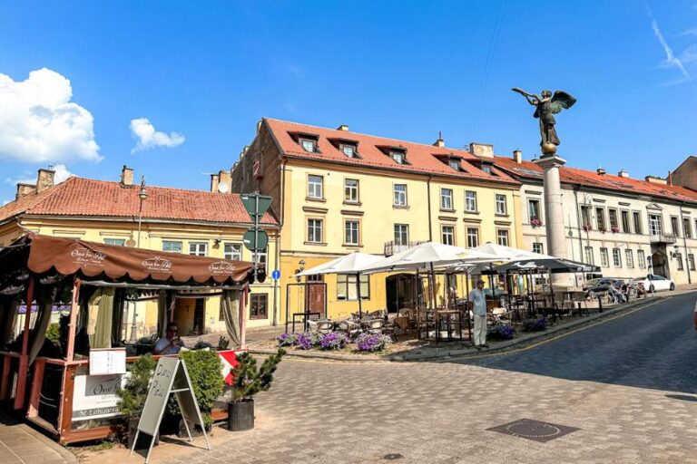 Square in Vilnius with patios and a column