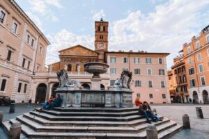 stairs of a fountain in front of a building in Rome | Grand Tour of Europe
