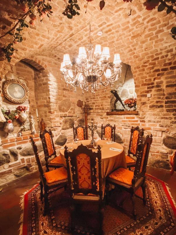 dining table in a brick walled room