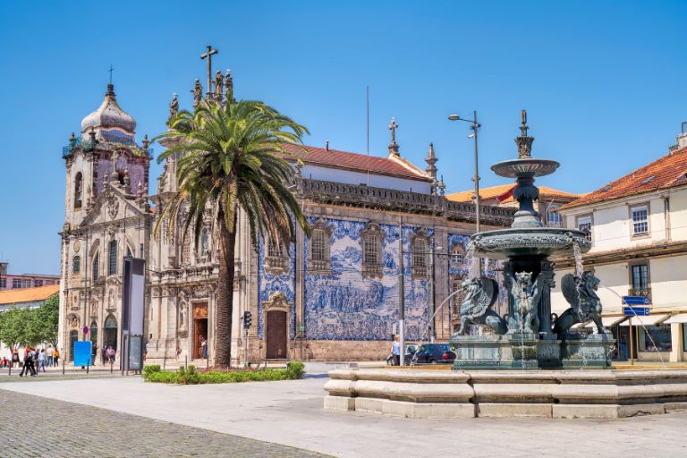 a fountain in front of a church in Porto