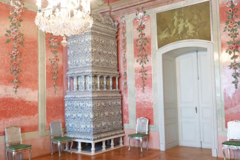 pink room with blue stove