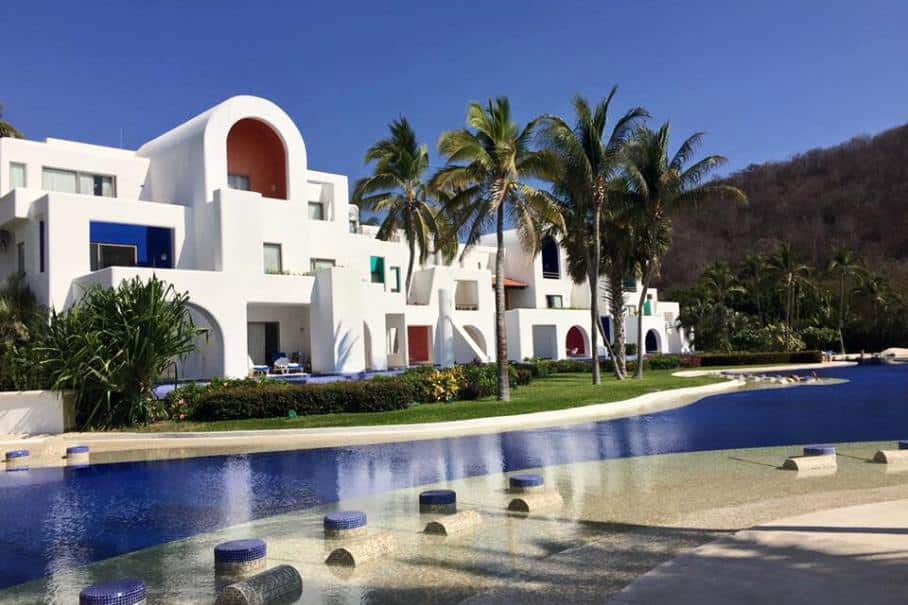hotel with a pool at an all-inclusive resorts