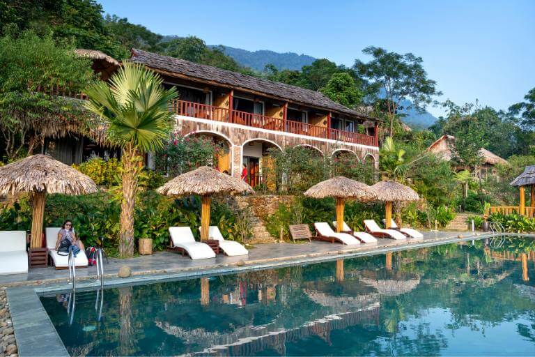 exotic resort pool and chairs