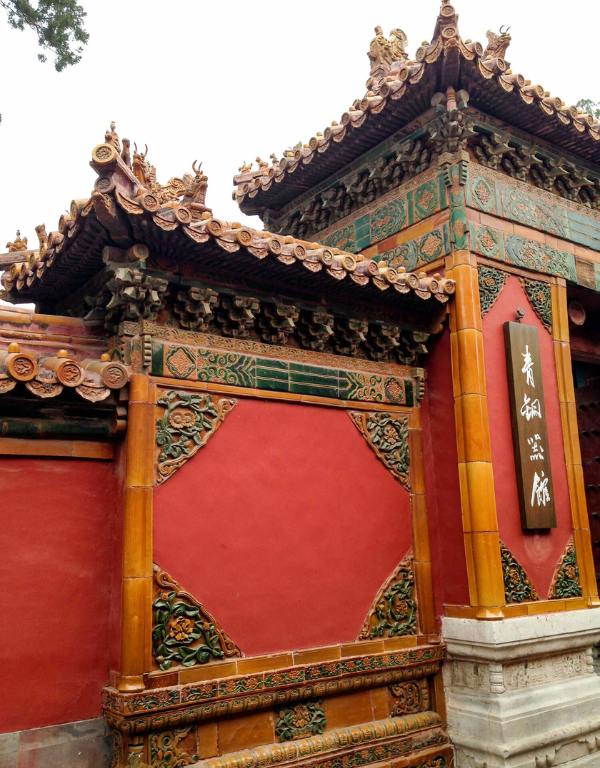 red wall with ornamentation
